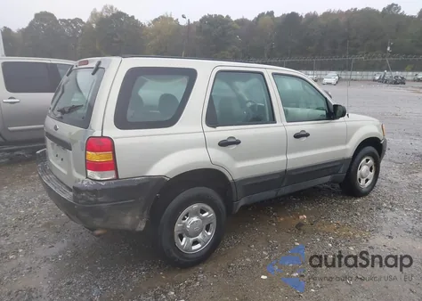 2003 Ford Escape Xls z USA, uszkodzony, nr VIN 1FMYU02113KC25514